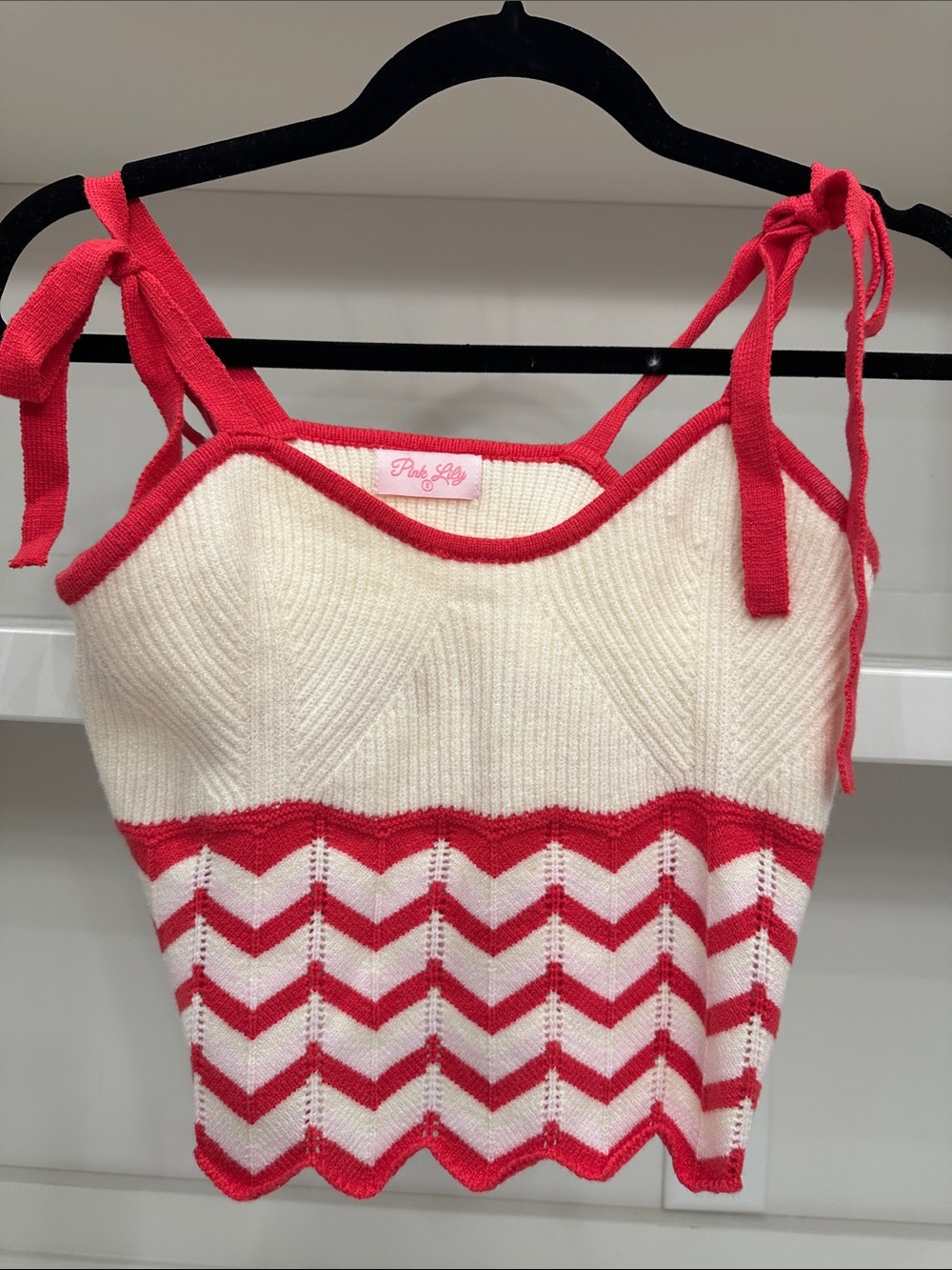 Pink Lily small red and white top. Like new